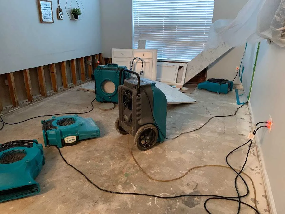 Dehumidifier in flood-cut room for Water Damage Restoration in Sheldon